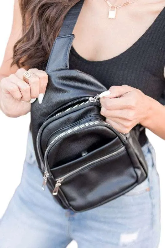 Black vegan leather sling bag